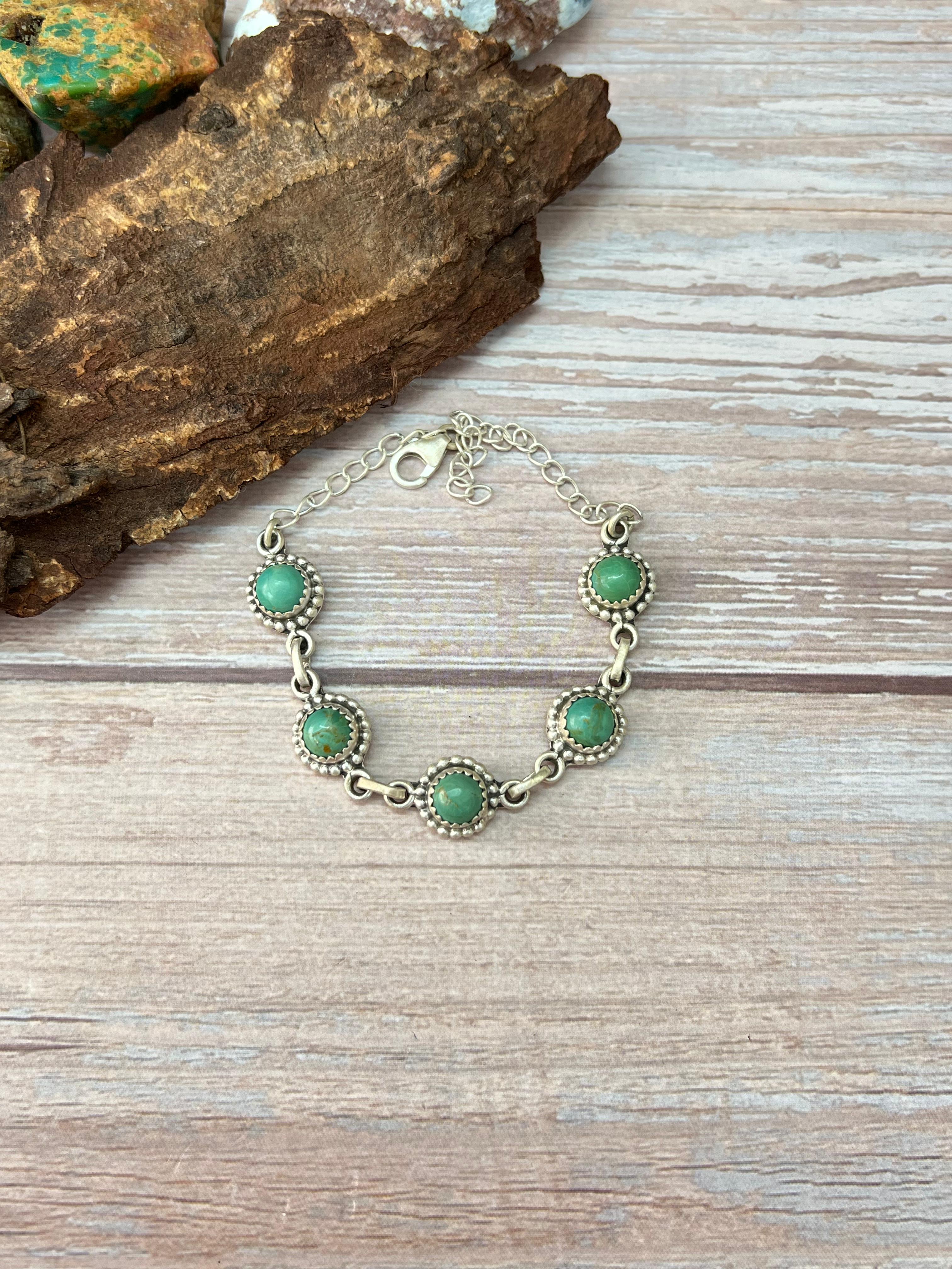 Handmade Sterling Silver Kingman Turquoise Bracelet with Signed Nizhoni